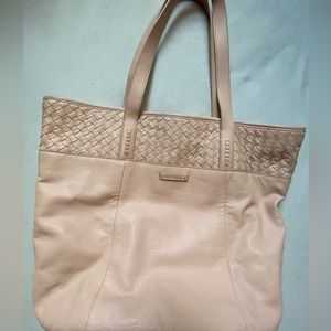 Cole Haan leather purse. Light pink outside. Great condition.